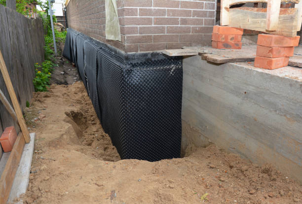 Happy homeowners after waterproofing job in Mechanicsville